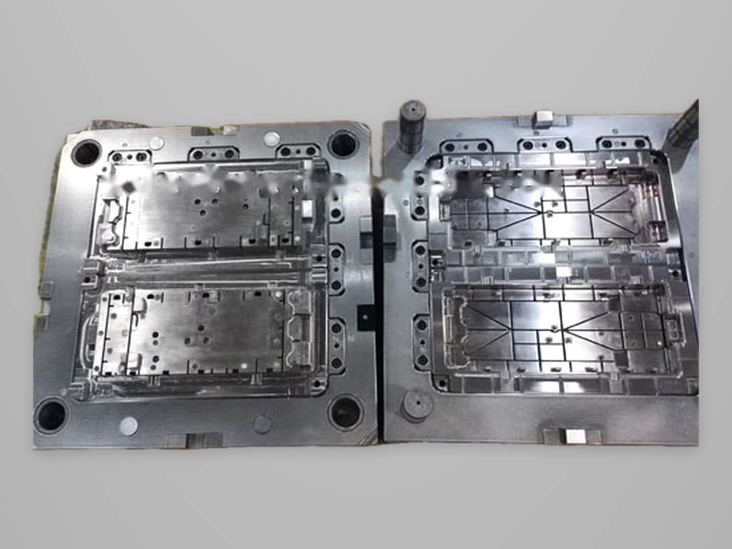 Family mold for plastic electronic panel